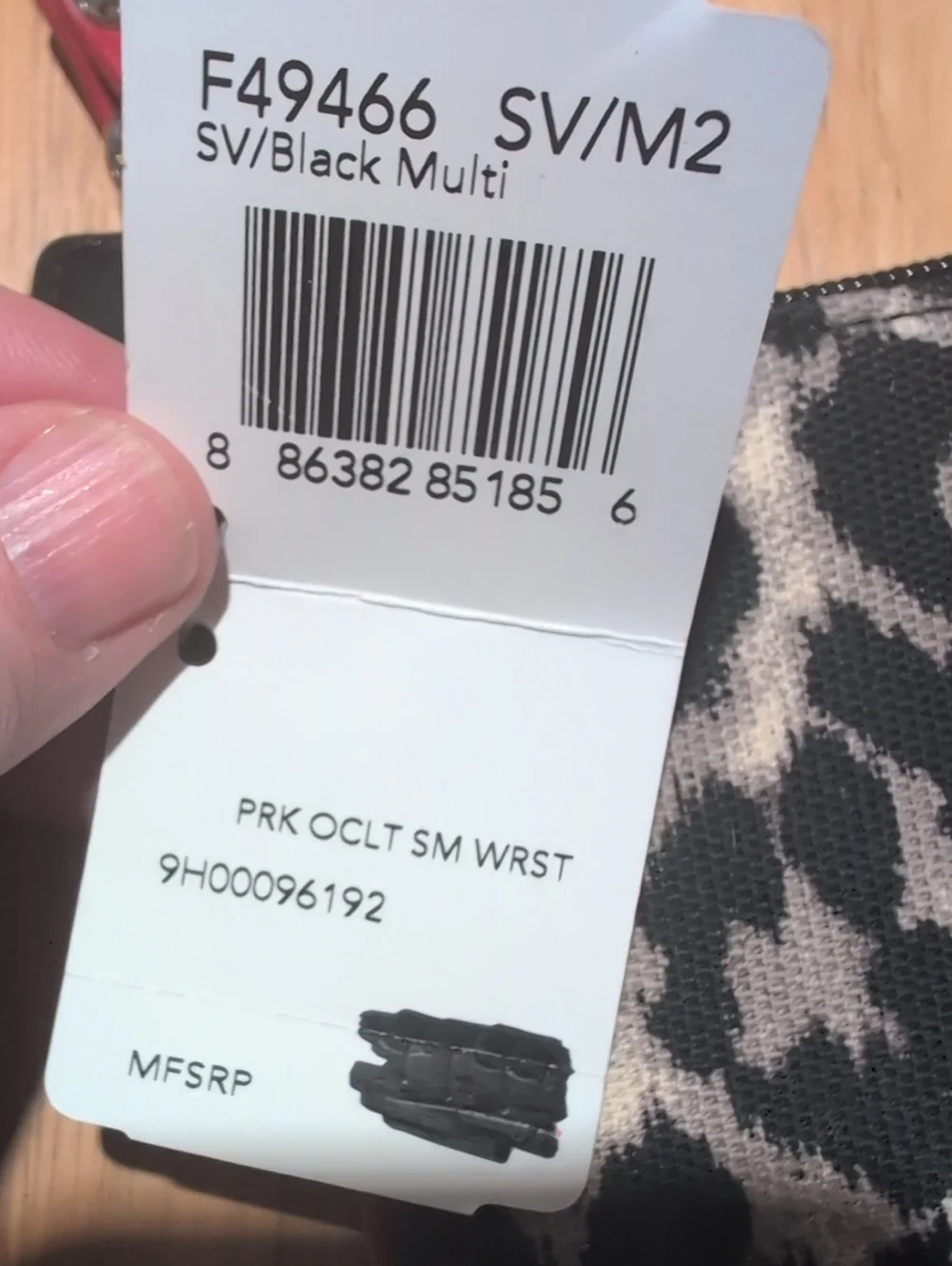 Coach Park Ocelot Wristlet w/Flaw *Please Read